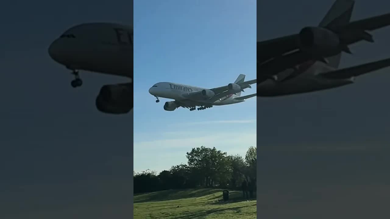 Emirates Airbus A380 super low flying over houses #planespotting #avaition #heathrow